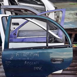 Chapa de puerta hyundai accent año:1998