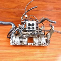 Múltiple de admisión Nissan d-21 2.4 año:1998