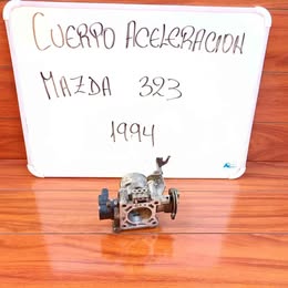 Cuerpo de aceleración mazda 323 año:1994