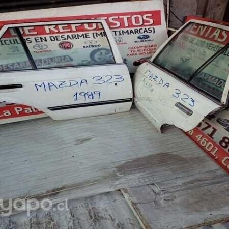 Luneta Puerta Trasera izquierdo Mazda 323 1998